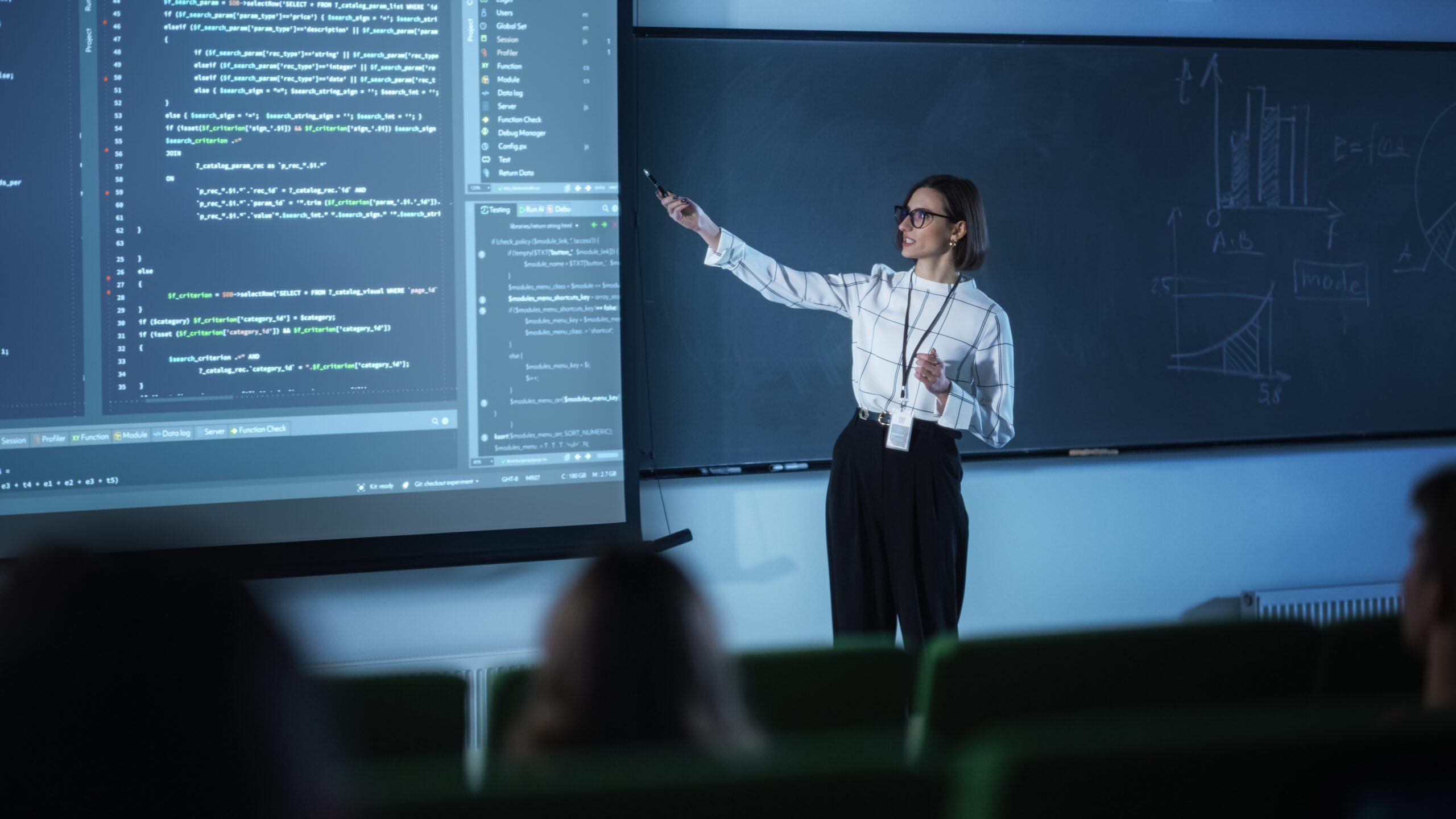 a teacher using an Alpec classroom laser pointer to point at a blackboard